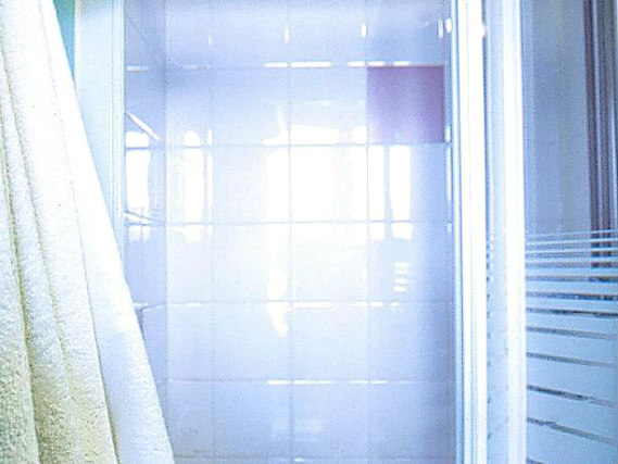 Relax in the private bathroom in your room at Bankside Apartments